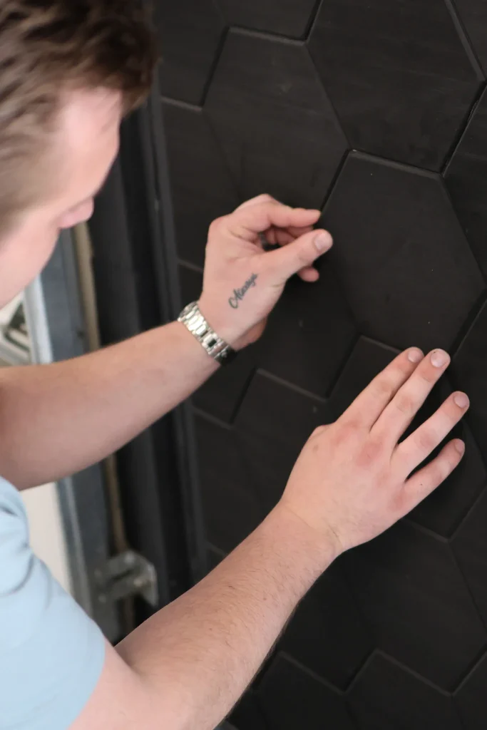 Hexagon Black Ferreon Tile being installed