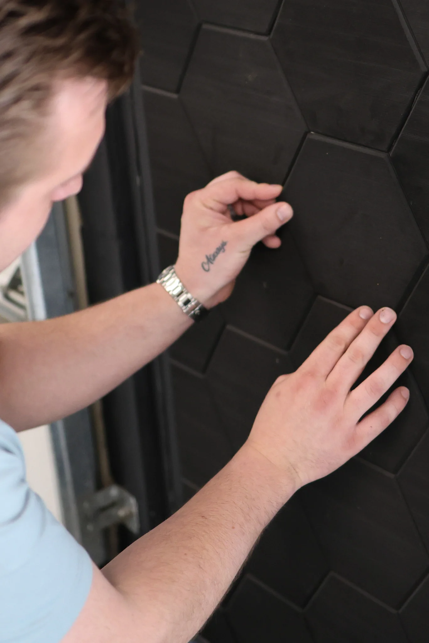 Hexagon Black Ferreon Tile being installed